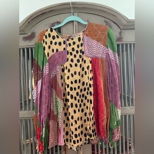 Anthropologie multi print shirt with ruffled sleeves
